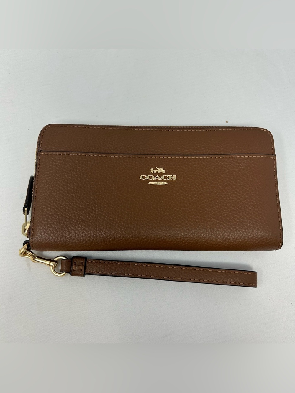 COACH pebbled leather accordion zip wallet with wristlet strap brown